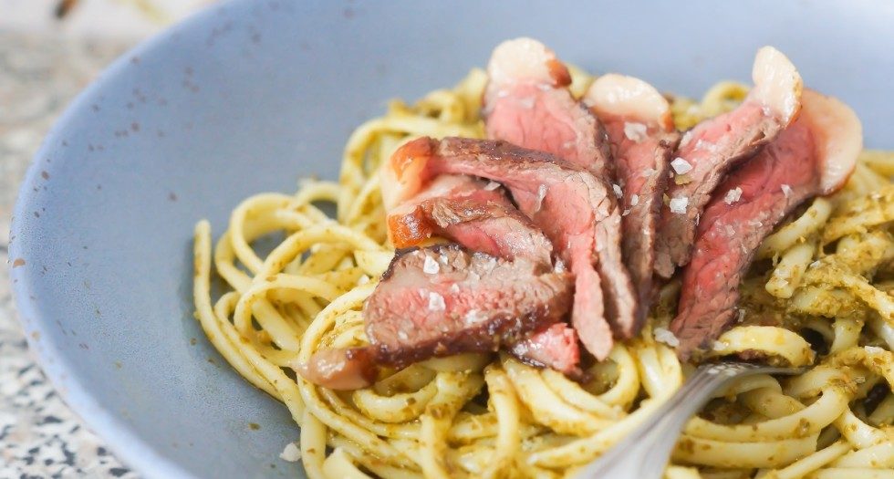 Spaghetti with basil pesto and dry-aged steak