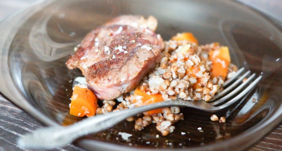 Dry-Aged beef steak with buckwheat, onions and carrots